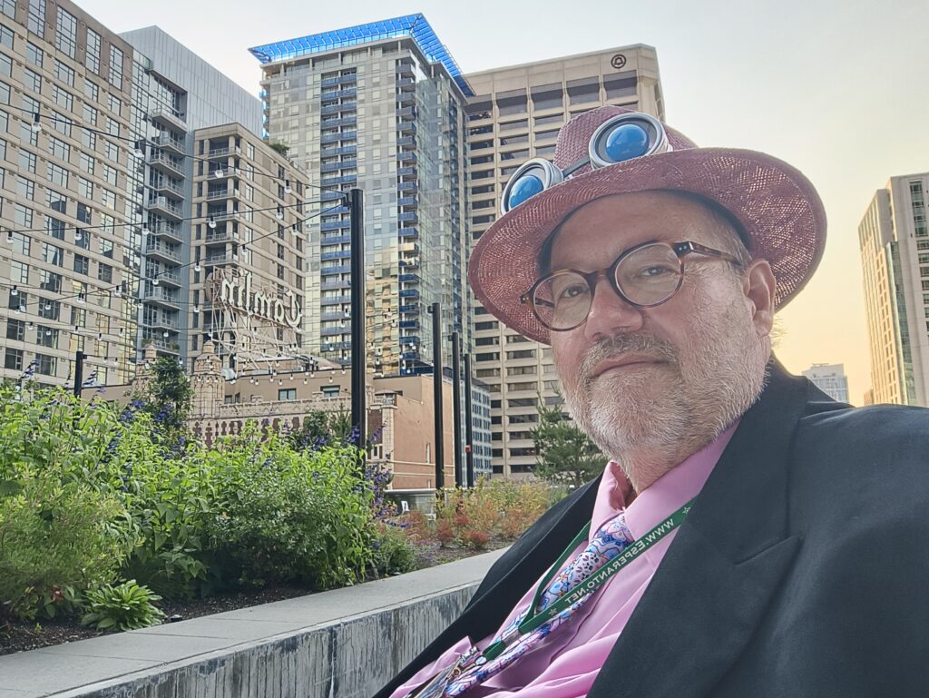 an older man sitting on the garden terrace at the Seattle Worldcin