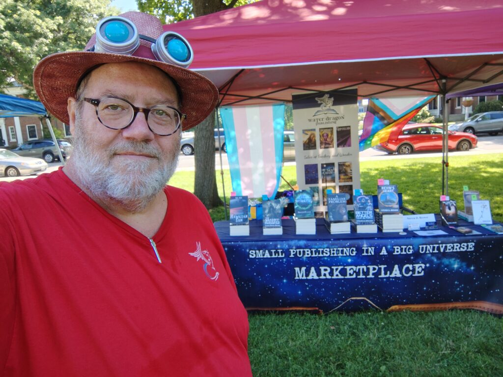 an older man in front of a vendor tent